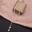 Long pearl cross dainty