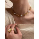 Knotted pearl necklace