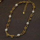 Knotted pearl necklace