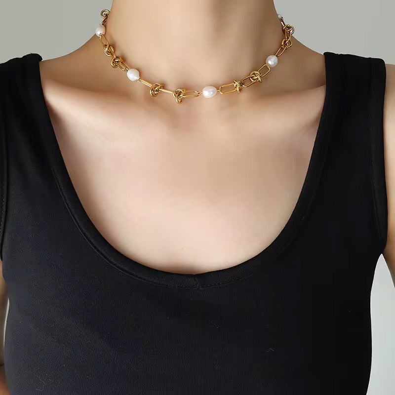 Knotted pearl necklace