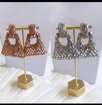 Oversized trendy earrings
